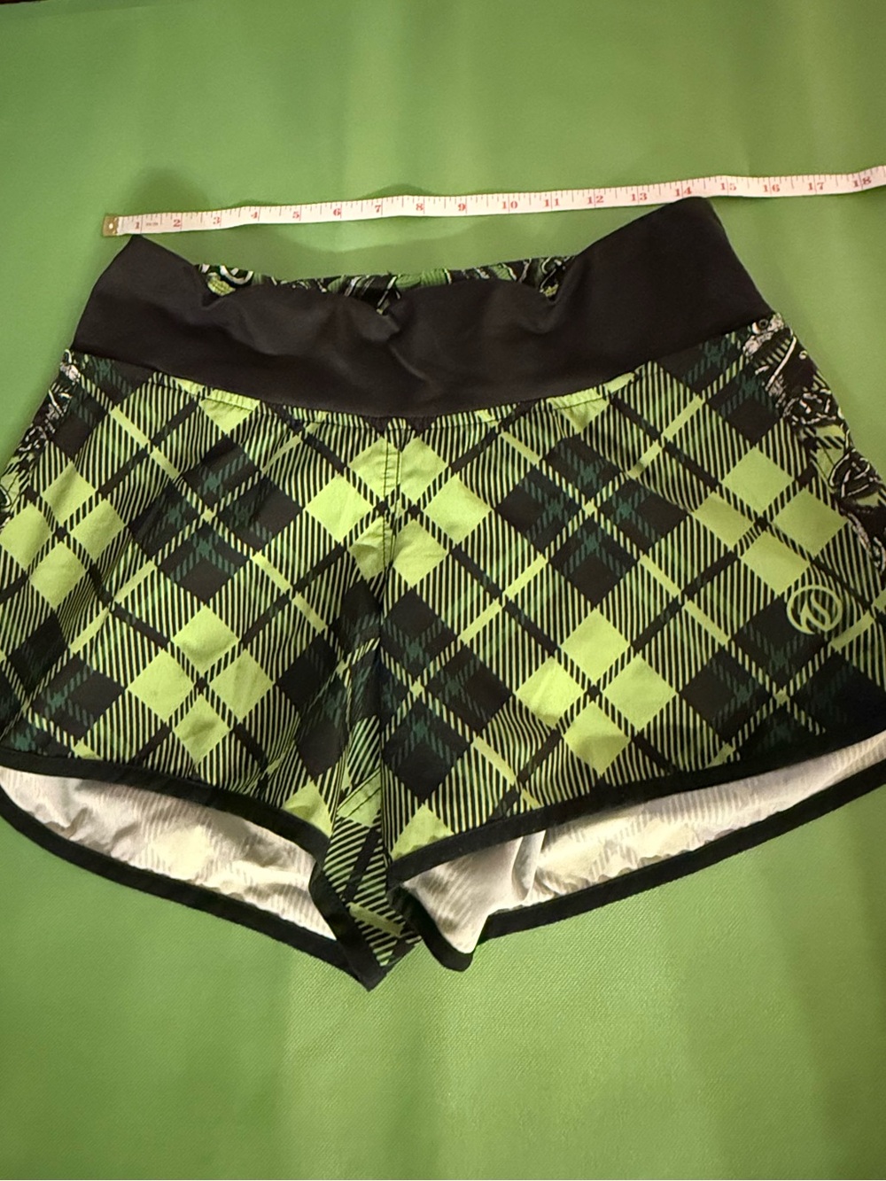 INB 10 Celtic Knot, plaid running shorts.